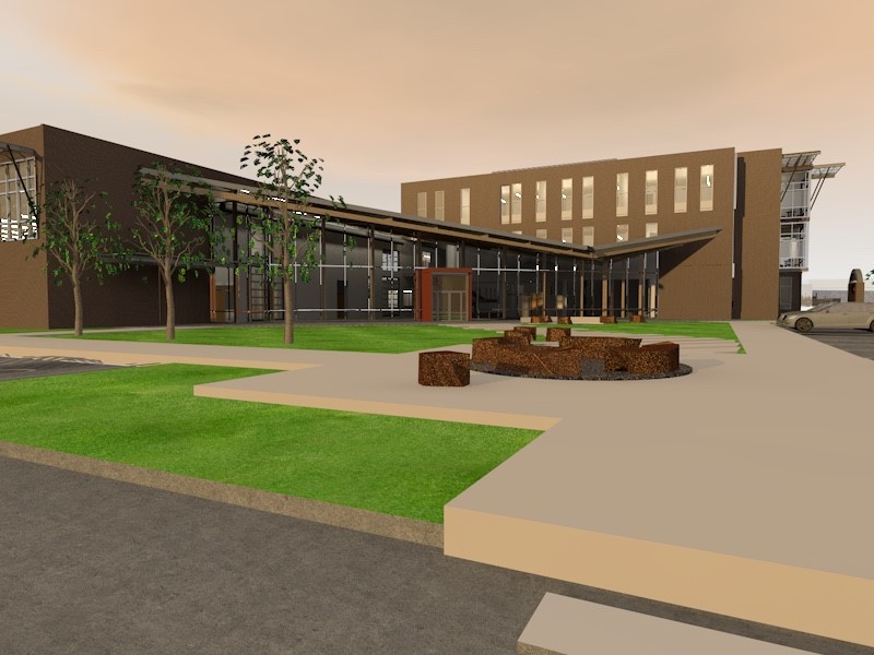 concept drawing of new vocational building, brick building, large front windows, trees, seating area, front view