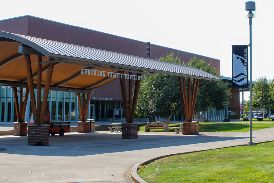 Anderson Family Pavilion The Anderson Family Pavilion features a wooden canopy with brick support pillars, surrounded by green grass and trees
