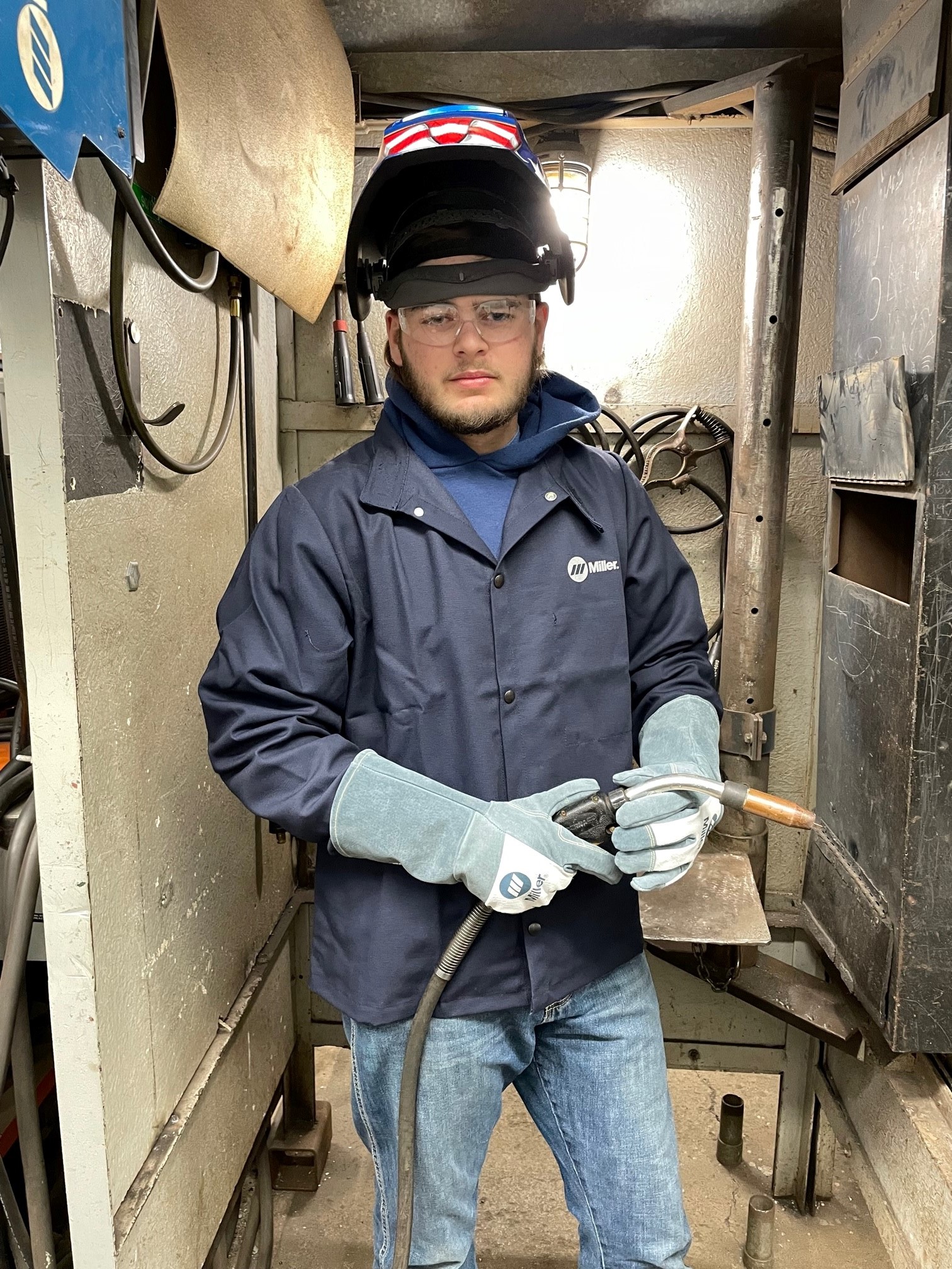 Welding student in protective gear