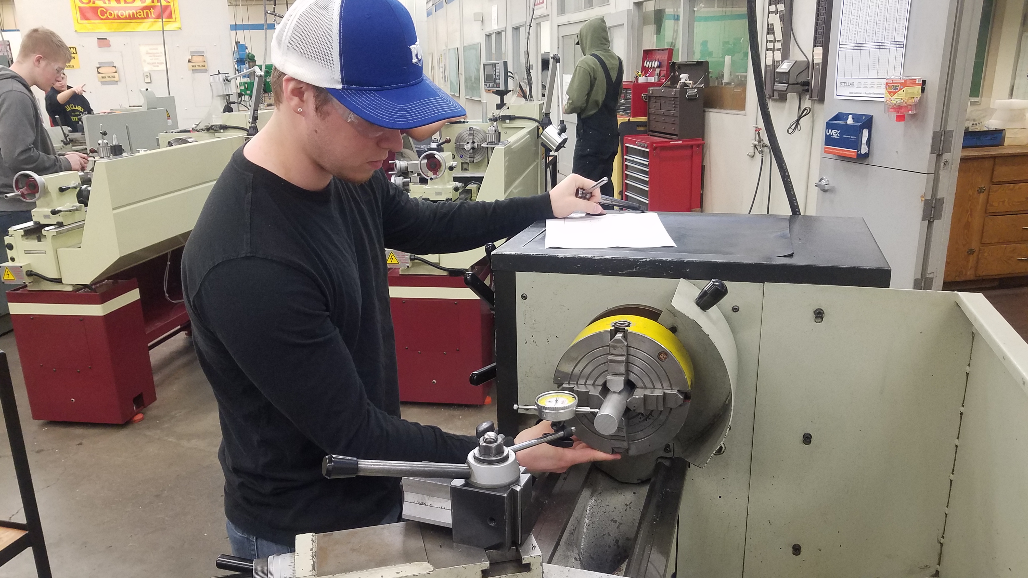 Students using lathes in the classroom