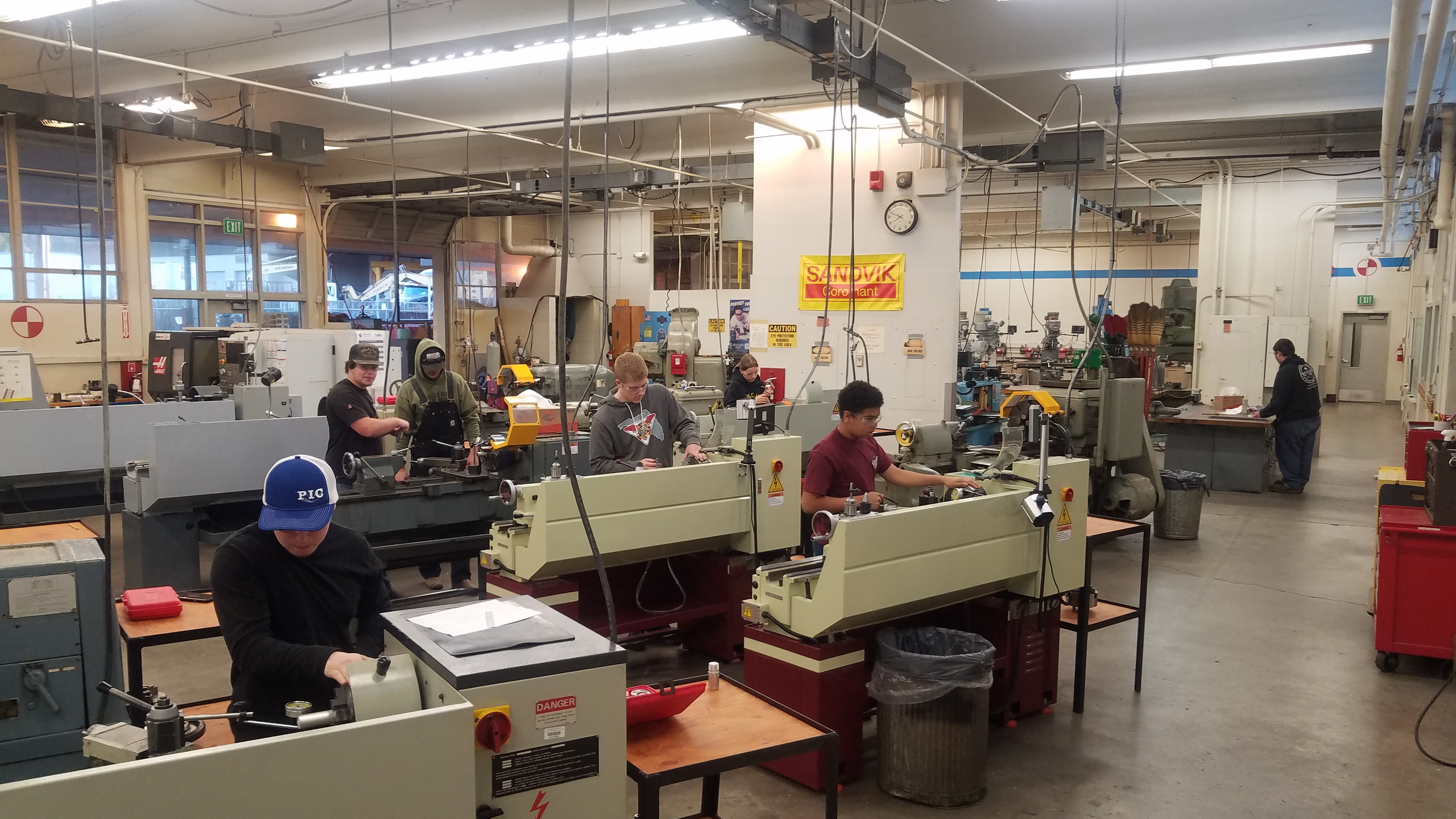 Students using lathes in class