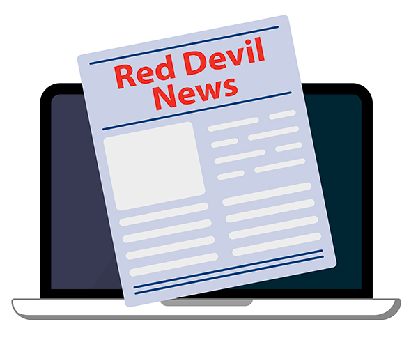laptop with newspaper that reads Red Devil news