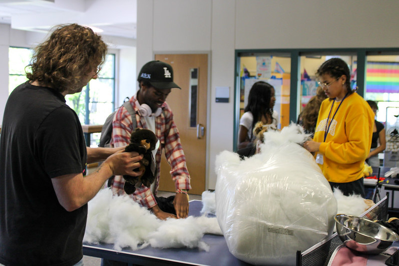 Stuff-A-Fluff People stuffing small stuffed anuimals durring LCC's Welcome Week Stuf-A-Fluff event