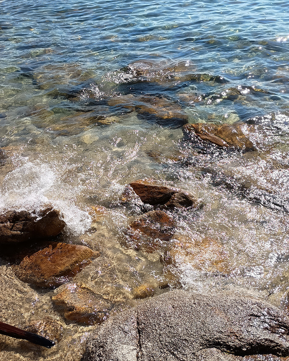 An up close shot of the crystal clear water in Eagle lake