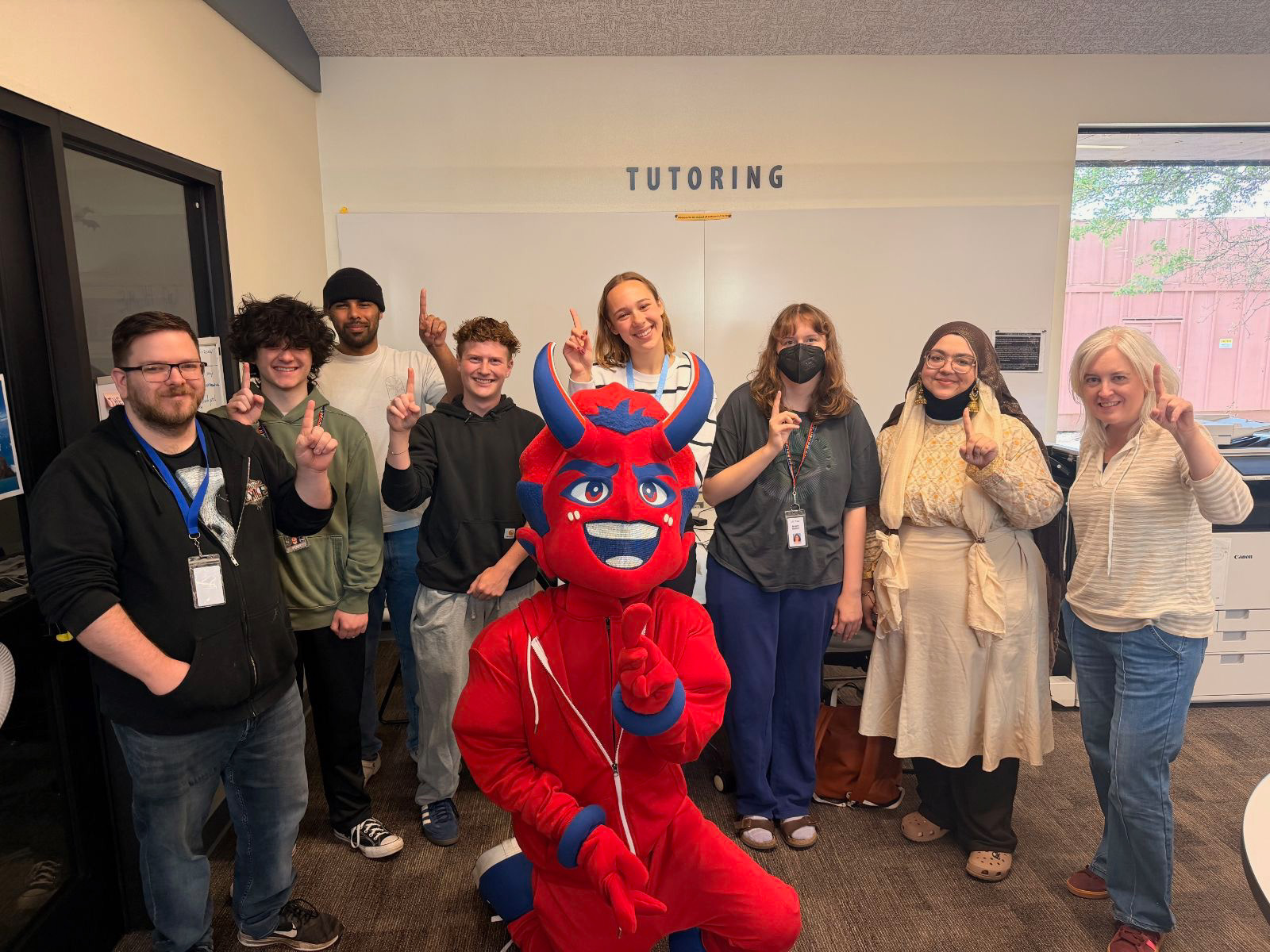 Tutoring Center Staff Tutoring center staff posing with Flare LCC's mascot
