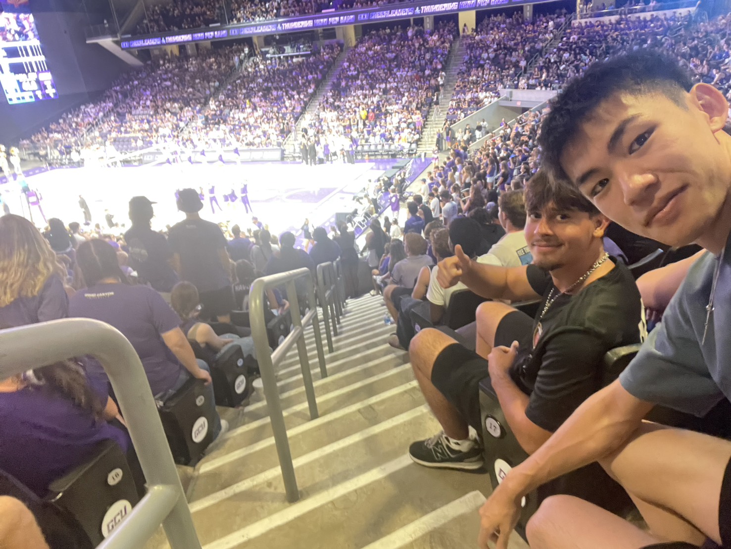 international students at a professional basketball game