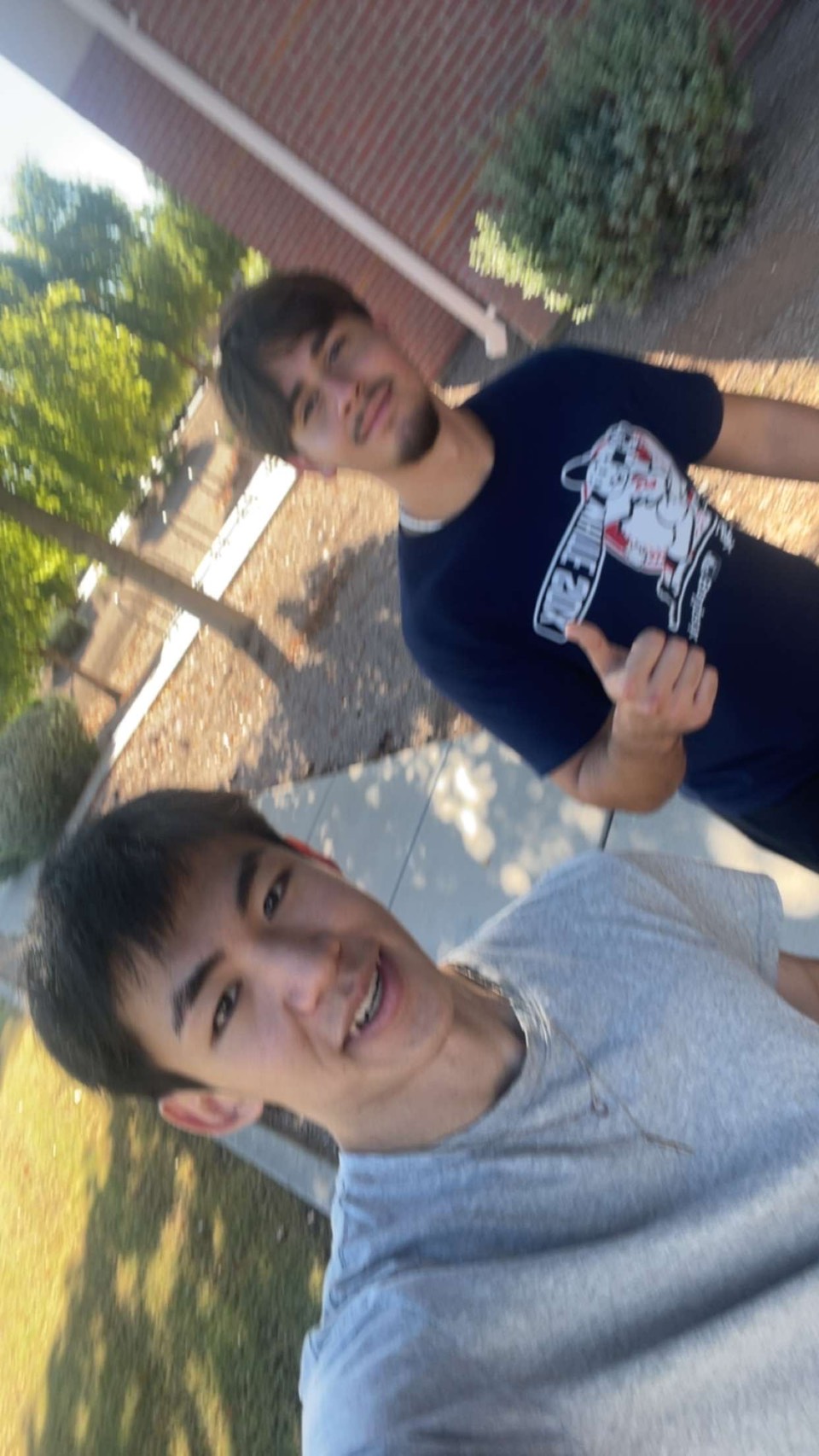 two students taking a selfie on the Lower Columbia College Campus