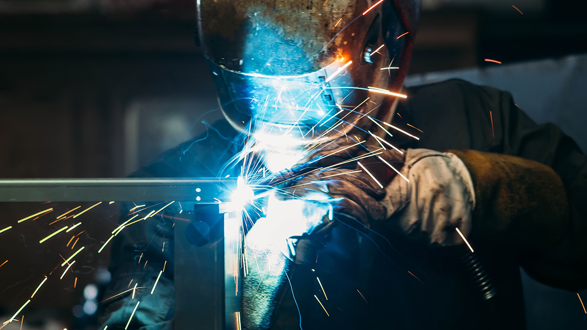a welder fixing a joint