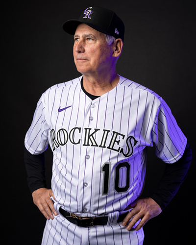 Bud Black posing in his Rockies number 10 baseball uniform